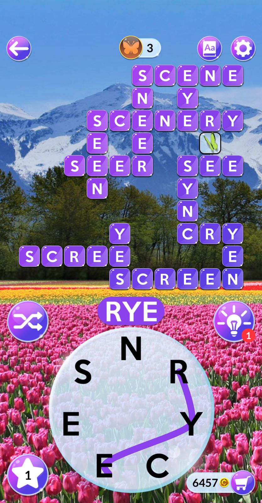 Word puzzle game with mountain and tulip background.